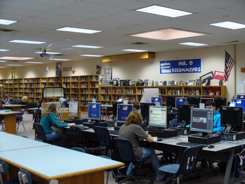 Kids working at computers in the library